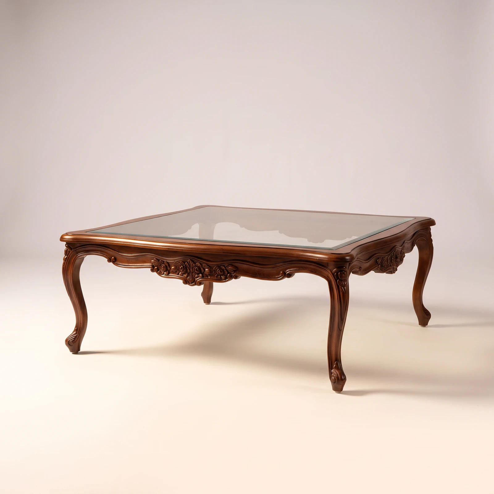 Victorian teak centre table with curved cabriole legs, hand-carved floral detailing and rectangular glass top